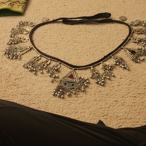 Silver and Multicolor Statement This Jepsiy Billt All Silver With Strain Made.